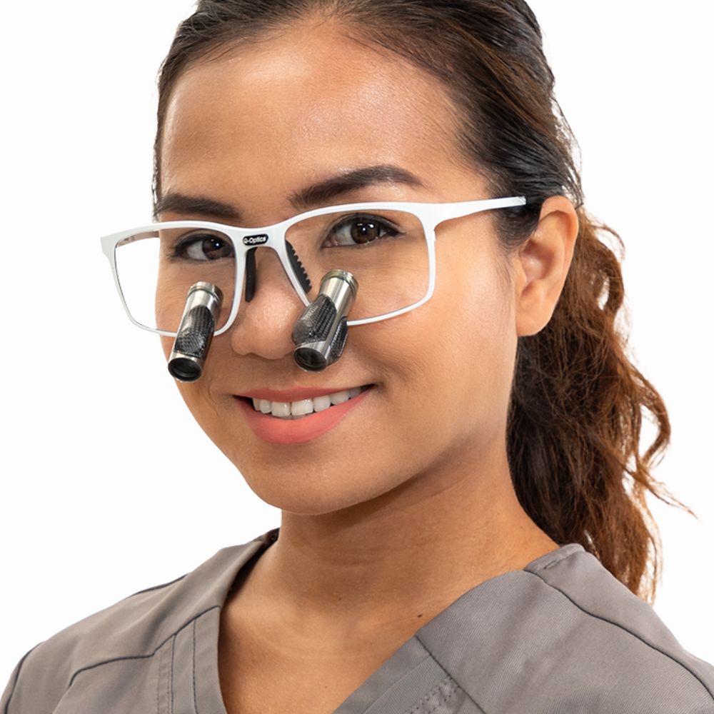 Female dentist wearing Q-Optics 3.5 Prismatic Loupes